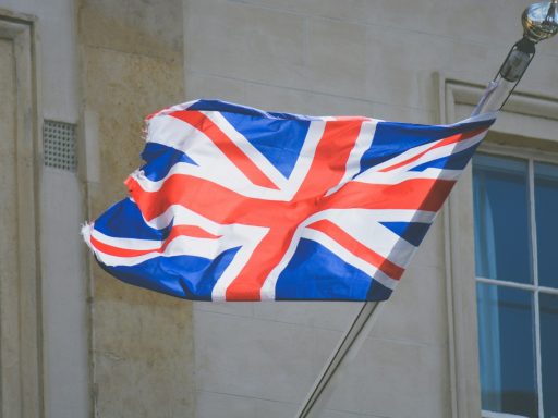 raised United Kingdom flag